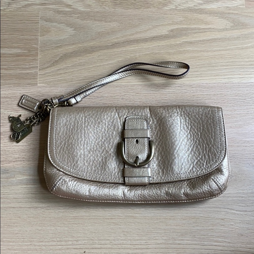 Gold coach wristlet